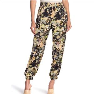 BCBGmaxazria dark floral joggers with zip pockets